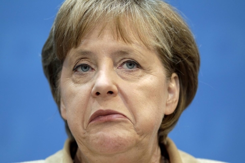 German Chancellor and chairwoman of the German Christian Democrats, Angela Merkel reacts during a news conference after the party's weekly executive committee meeting in Berlin, Germany, Monday, May 23, 2011. Chancellor Angela Merkel's conservative party slipped behind the environmentalist Greens to third place in a state election in Bremen on Sunday, its worst result in Bremen in over 50 years. (AP Photo/Michael Sohn)